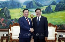 Top leader of Laos applauds Hanoi - Vientiane cooperation