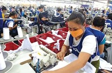Laos speeds up granting licences to foreign workers