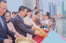 President joins OVs in traditional carp release ritual