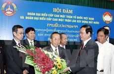 Vietnam, Lao Fronts exchange work experience 