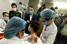 First persons receive injections of "made-in-Vietnam" COVID-19 vaccine 