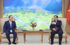Government leader receives former Japanese PM Suga Yoshihide