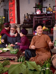 Vietnamese people preserving cultural values of traditional Tet