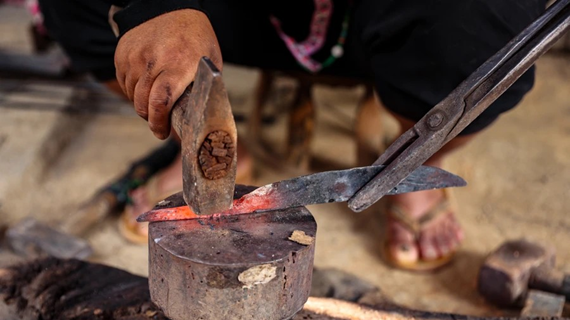 Hmong ethnic people preserving traditional blacksmithing