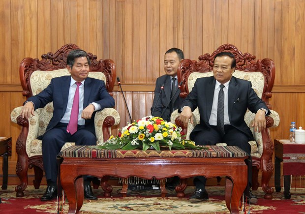Vietnamese, Lao ministries’ cooperation applauded hinh anh 1