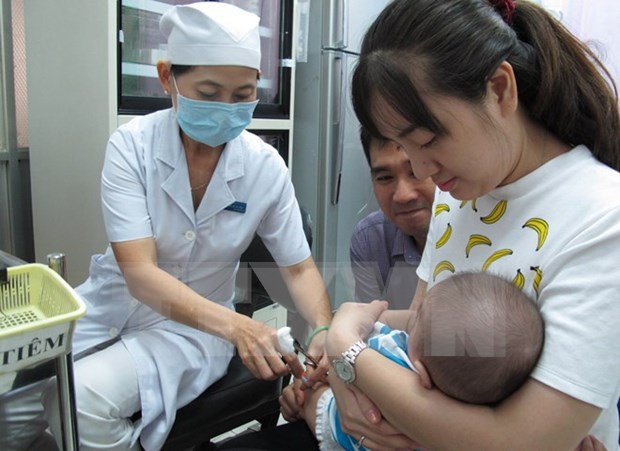 Monthly JE vaccination schedule benefits 2 mln children hinh anh 1