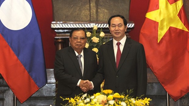 Lao media spotlights upcoming visit of Vietnamese President hinh anh 1