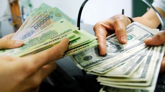 Reference exchange rate goes down by 9 VND hinh anh 1