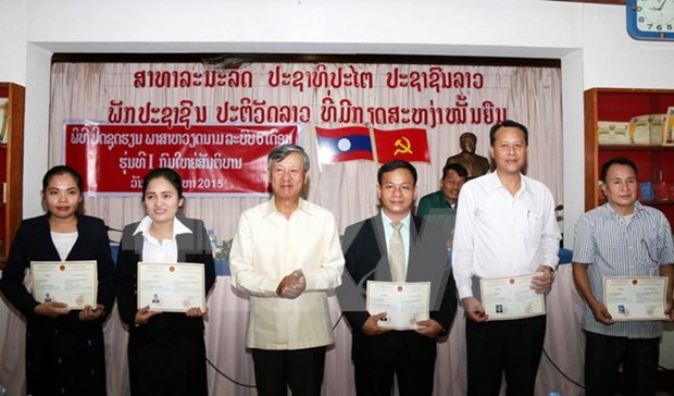 First Vietnamese course for Lao police officers concludes hinh anh 1