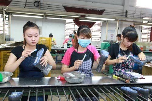 Sides agree on 7.3 percent raise of minimum wage hinh anh 1