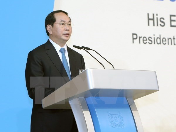 President Tran Dai Quang winds up tour of Brunei, Singapore hinh anh 1