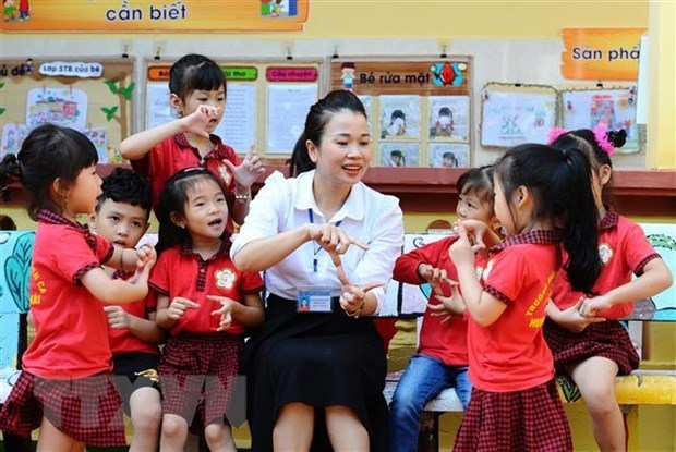 Experts brainstorm on building new pre-school programme hinh anh 1