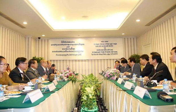 Vietnamese, Lao fronts forge cooperation in ethnic, religious affairs hinh anh 1