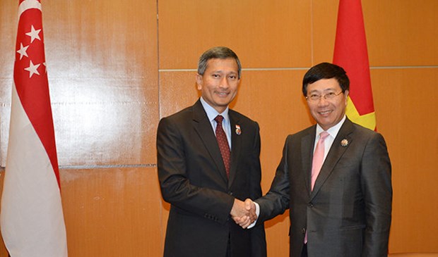 Deputy PM meets Singaporean Foreign Minister in Kuala Lumpur hinh anh 1