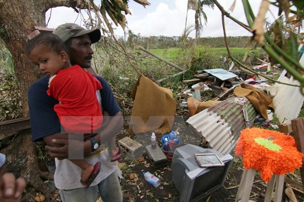Leaders condole with Fiji over typhoon disaster hinh anh 1