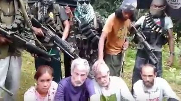 Philippine rebels threaten to murder hostages hinh anh 1
