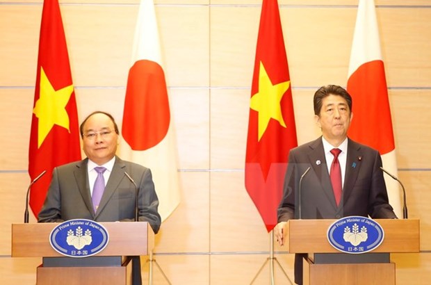 Prime Minister back to Hanoi following Japan visit hinh anh 1