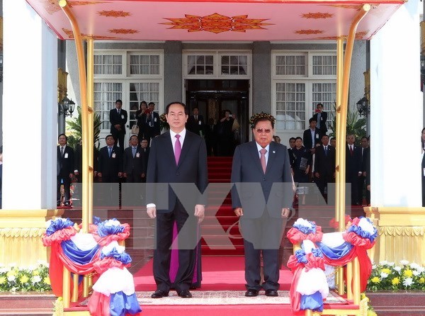 President Tran Dai Quang starts State visit to Laos hinh anh 1