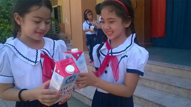 Nghe An children benefit from school milk programme hinh anh 1