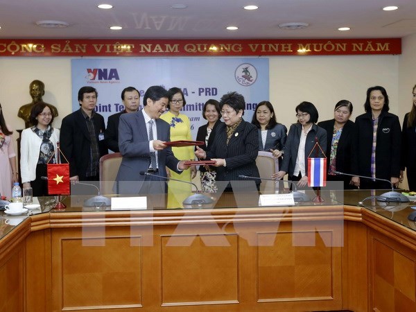VNA, PRD sign MoU on news exchange cooperation hinh anh 1