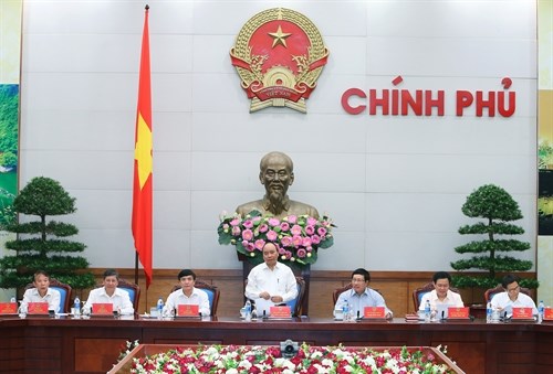 PM urges more care for workers hinh anh 1