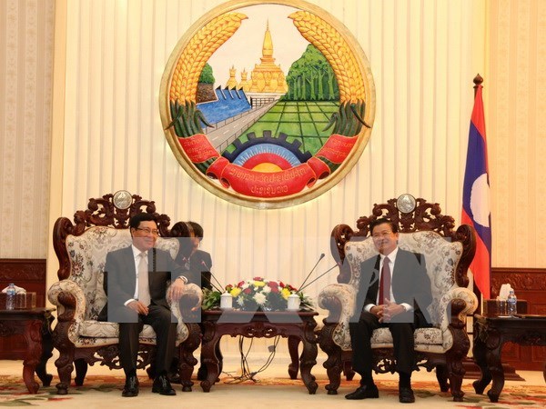 Lao PM hails Vietnam-Lao cooperative ties hinh anh 1