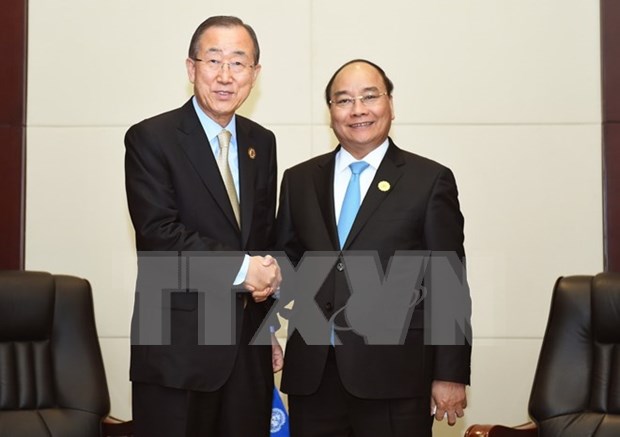 PM meets Australia counterpart, UN leader in Vientiane hinh anh 1