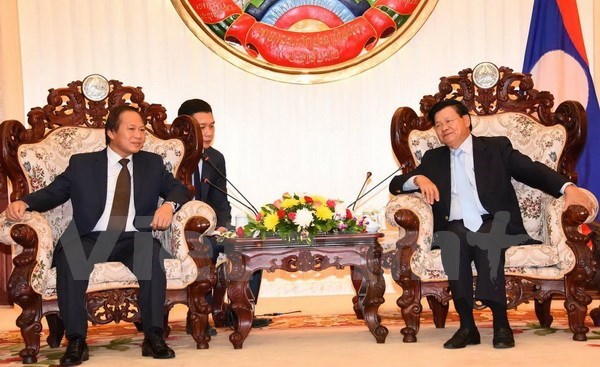 Lao PM asks for Vietnam’s support in e-government building hinh anh 1