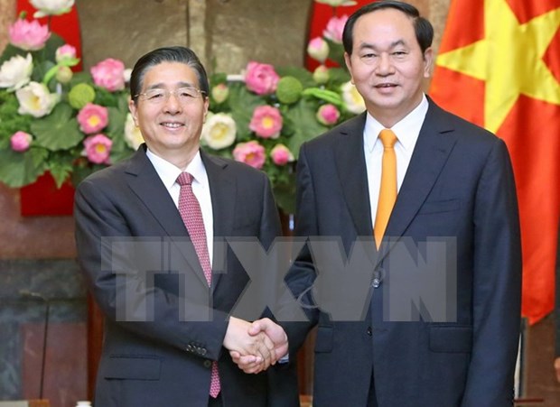 President hails new cooperation deals with Chinese ministry hinh anh 1