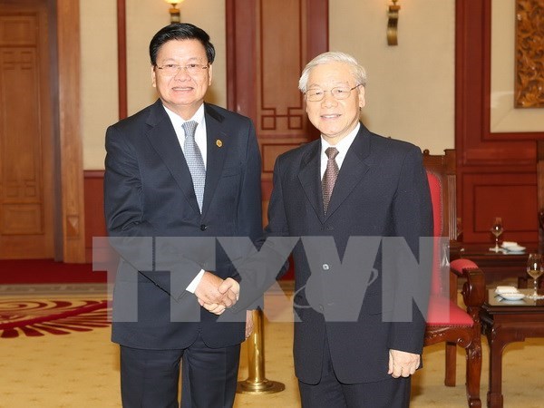 Party General Secretary greets Lao Prime Minister hinh anh 1