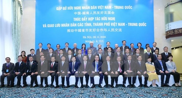 Vietnam-China friendship meeting promotes people-to-people exchange hinh anh 1