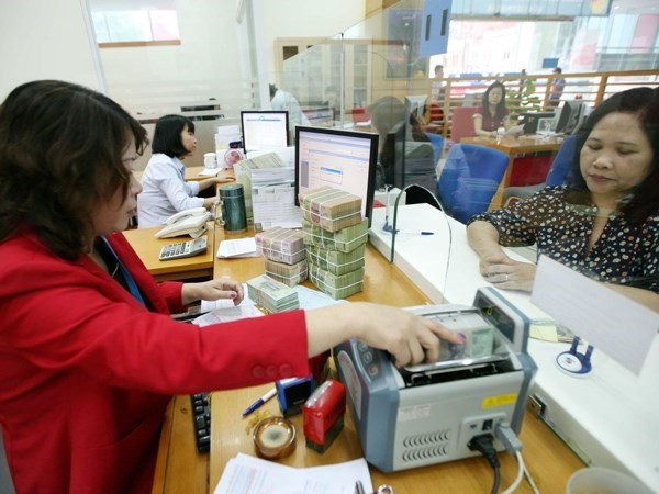 Banks told to not raise interest rates for coronavirus-hit borrowers hinh anh 2