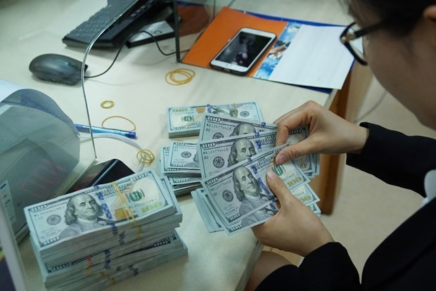Reference exchange rate up 5 VND on October 27 hinh anh 1