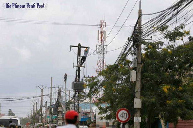 Cambodia, China work to enlarge rural power grid hinh anh 1