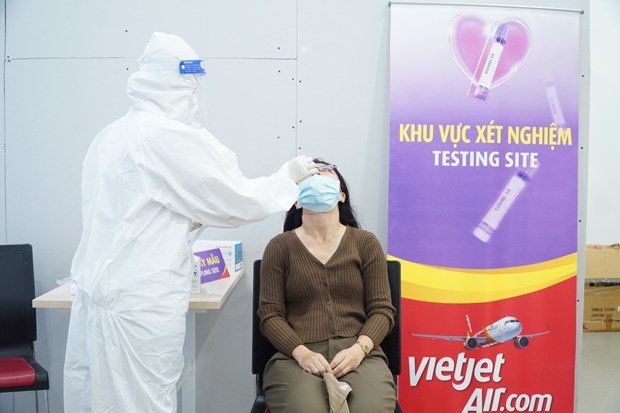 Vietjet increases domestic services with free COVID-19 tests, zero fare promotion hinh anh 1