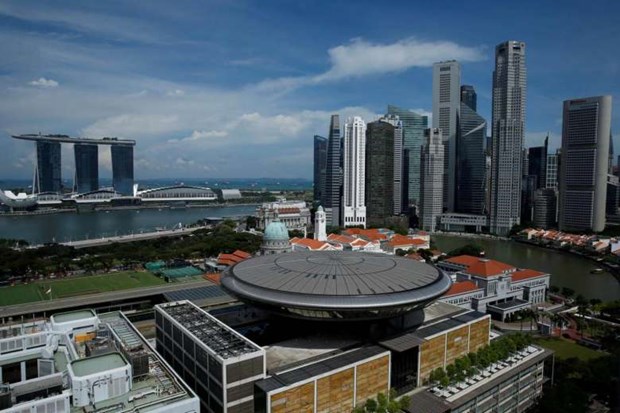 Singapore lowers economic growth forecast hinh anh 1
