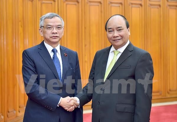PM urges Laos to monitor impacts of hydropower plants hinh anh 1