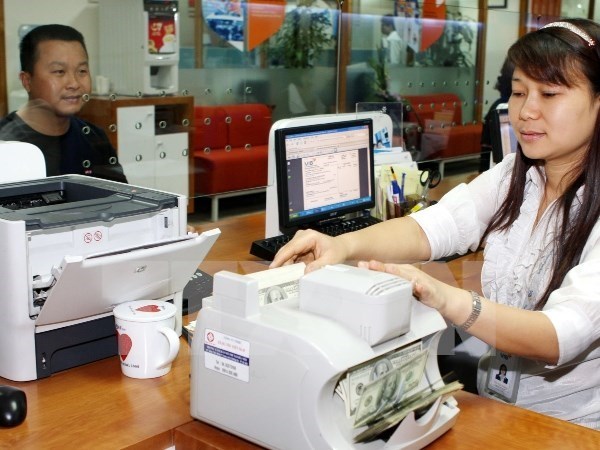 Reference exchange rate drops 5 VND hinh anh 1