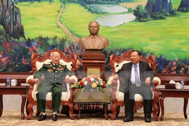 Lao leaders hail contributions of Vietnamese voluntary soldiers hinh anh 1