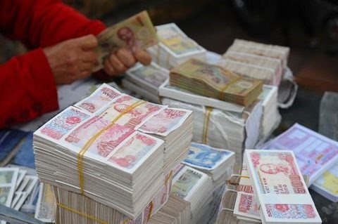 SBV saves 17.7 million USD not issuing low-value banknotes hinh anh 1