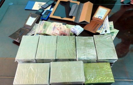 Two drug traffickers, 30 bricks of heroin seized in Son La hinh anh 1