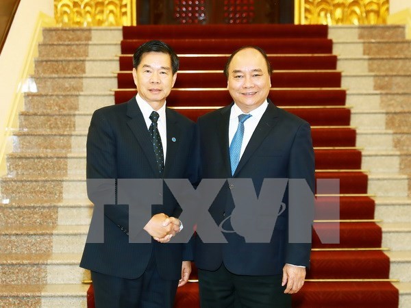 PM hails Hanoi – Vientiane cooperation hinh anh 1