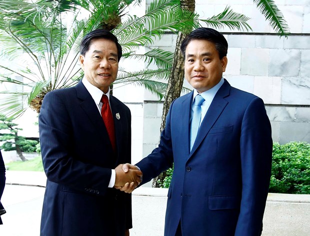 Hanoi shares administrative reform experience with Vientiane hinh anh 1
