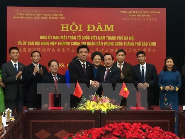Hanoi VFF Committee boosts ties with Beijing counterpart hinh anh 1