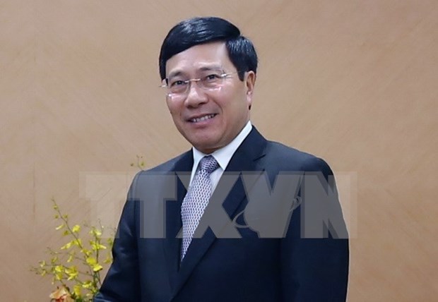 Deputy PM Pham Binh Minh visits China hinh anh 1