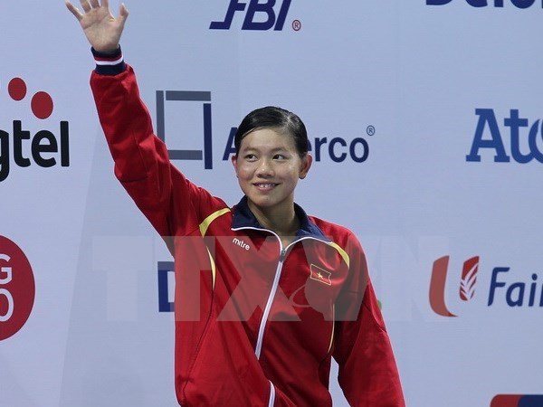 Vietnamese swimmer wins gold with new Asian record hinh anh 1
