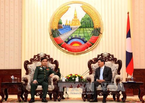 Lao PM urges closer coordination in searching fallen Vietnamese soldiers hinh anh 1