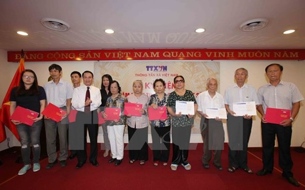 Vietnam News Agency marks Day of Invalids, Martyrs hinh anh 1