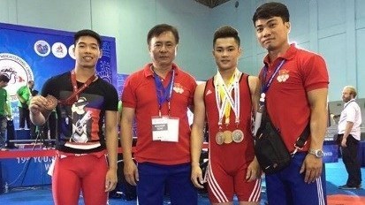 Vietnam wins 25 medals at Asian weightlifting champs hinh anh 1