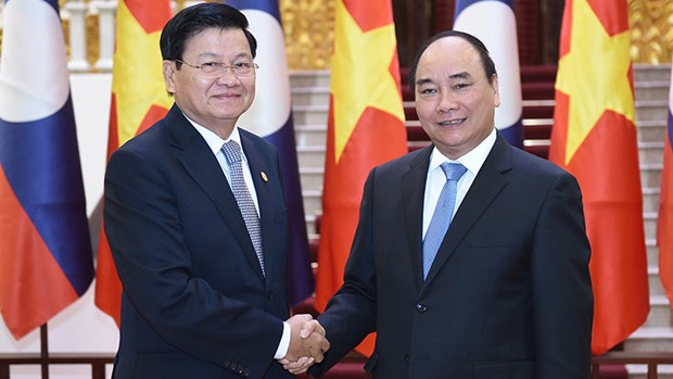 Lao PM starts official visit to Vietnam hinh anh 1